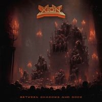 Xion - Between Shadows And Gods(Redvinyl) i gruppen VINYL / Kommande / Pop-Rock hos Bengans Skivbutik AB (5508435)