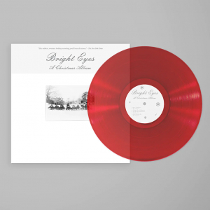 Bright Eyes - Split Seams/Vikt Hörn A Christmas Album (Clear Red) i gruppen VINYL / Julmusik hos Bengans Skivbutik AB (5634161)